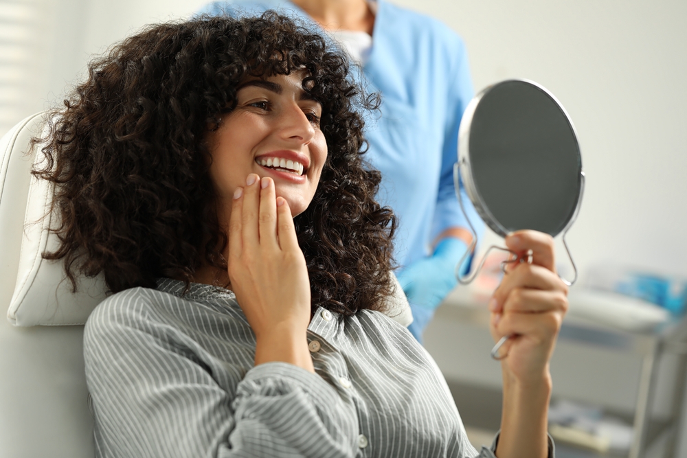 Happy Female Patient Relaxing During Dental Visit – Dentist El Dorado KS