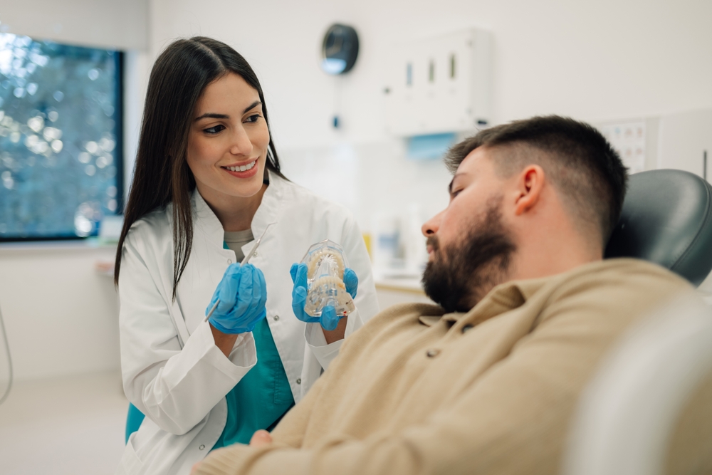 Happy Female Patient Relaxing During Dental Visit – Dentist El Dorado KS