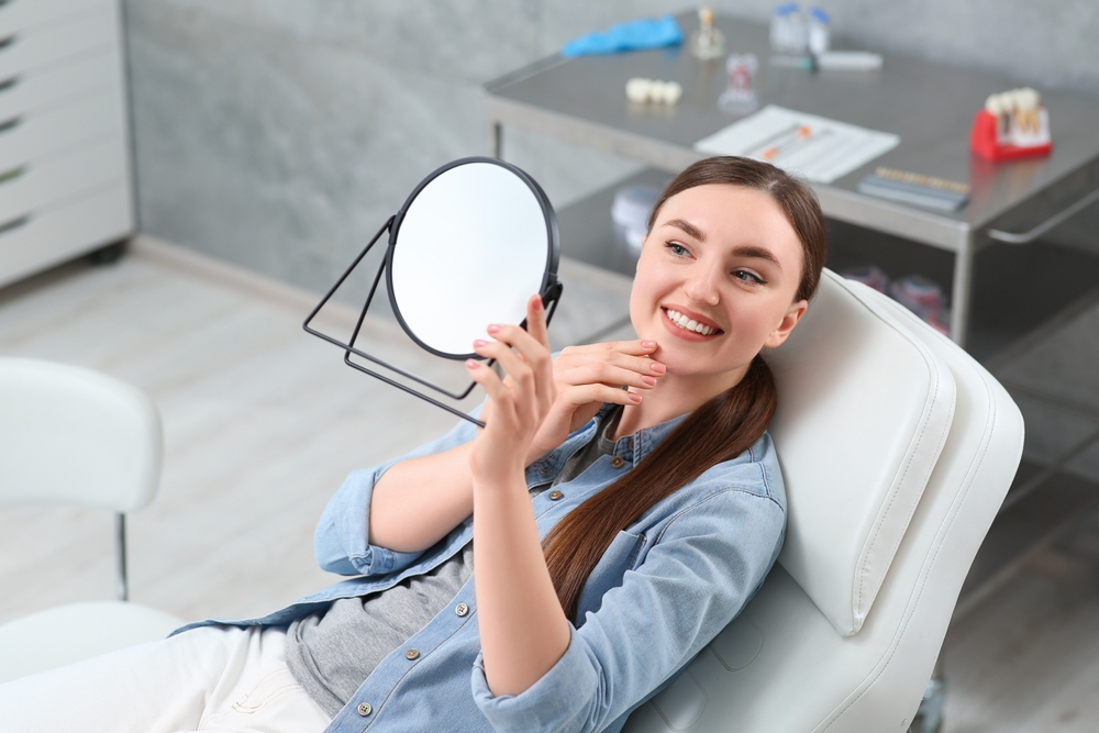 Happy Female Patient Relaxing During Dental Visit – Dentist El Dorado KS